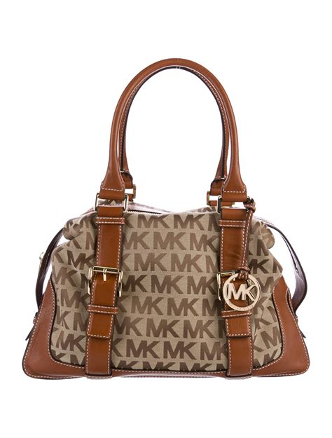 michael kors monogram purse.